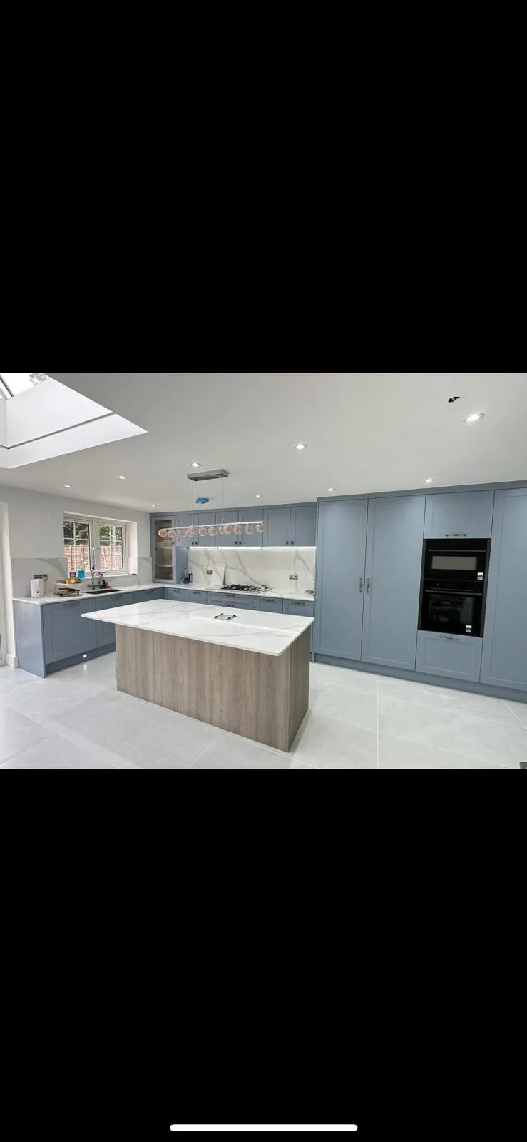 Blue Shaker Kitchen with Oak Island