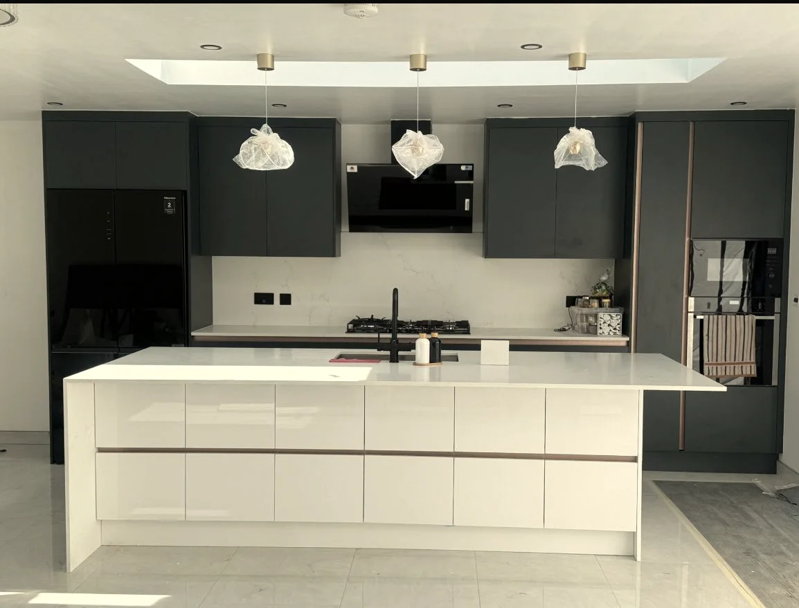 Minimalist White Kitchen with Charcoal Accents