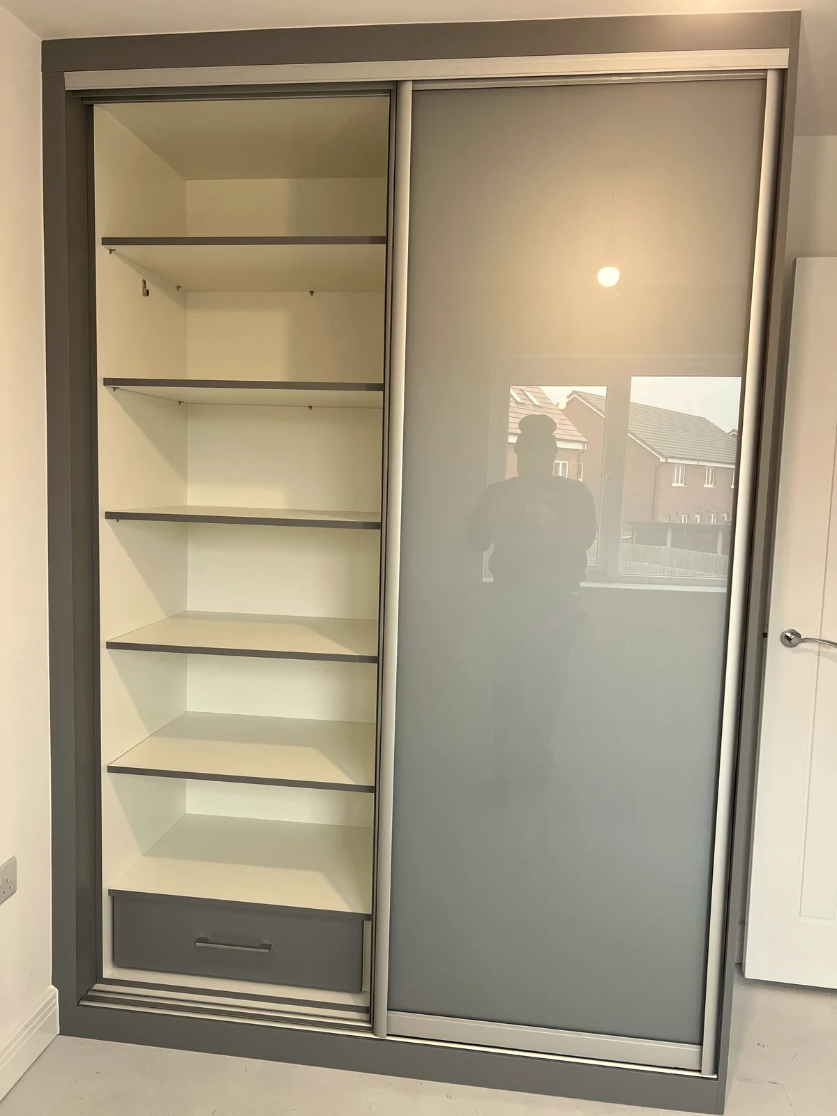 Contemporary Grey Sliding Wardrobe with Glass Panel