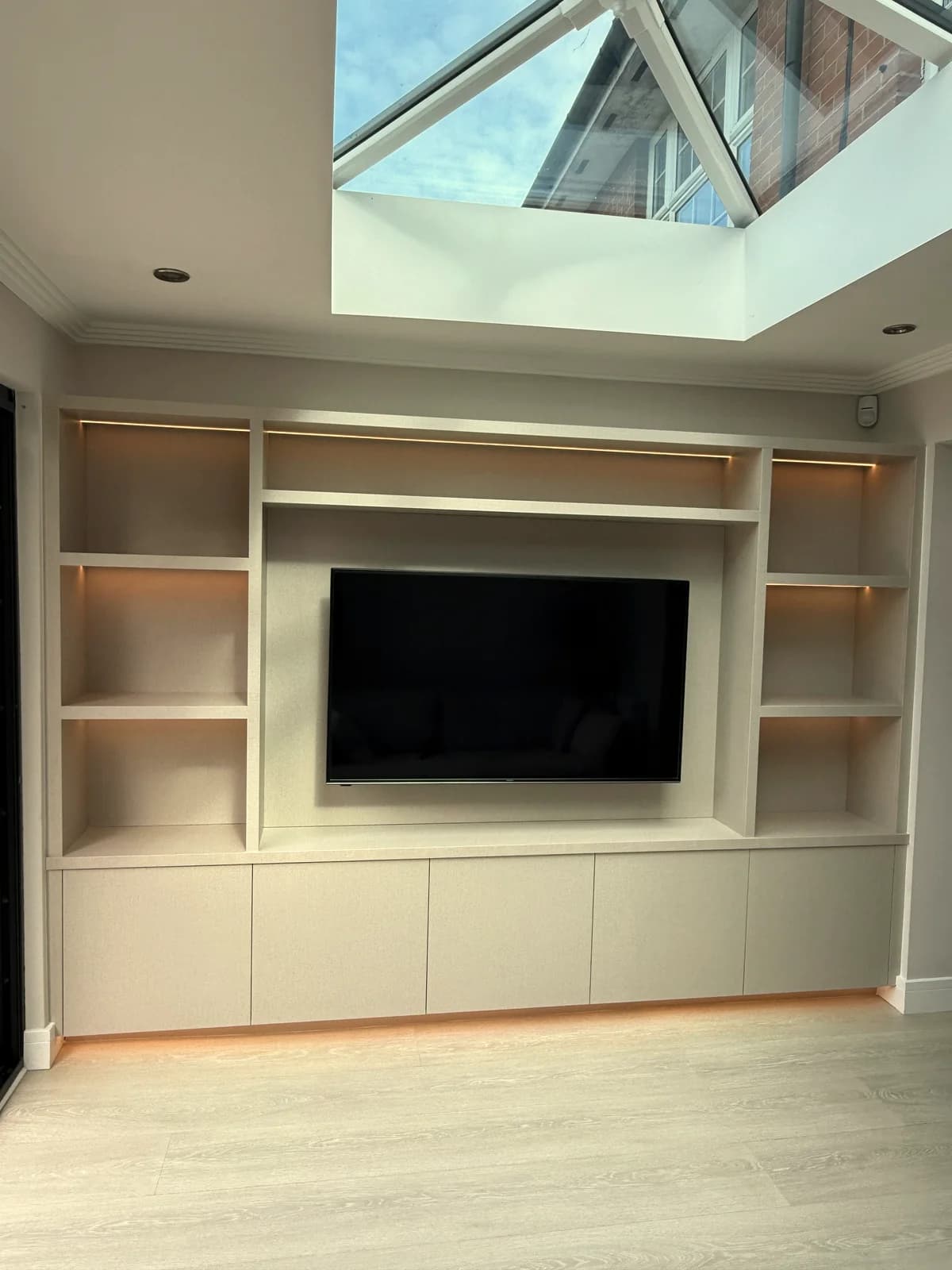 Bespoke cream built-in media centre